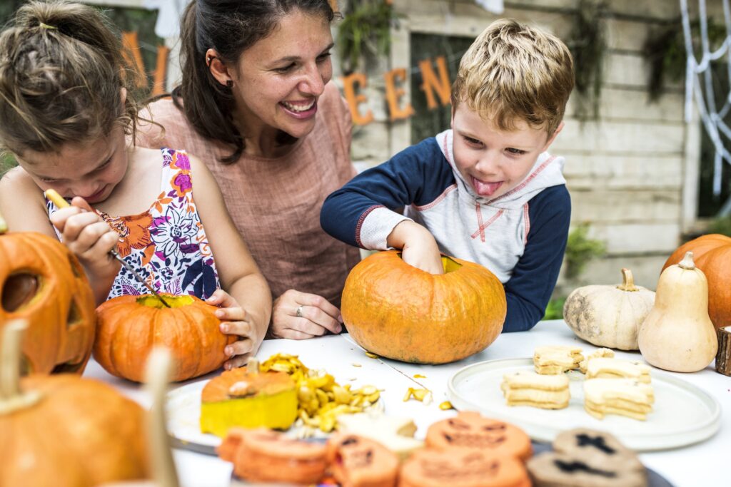 Intergenerational bonding whilst decorating pumpkins