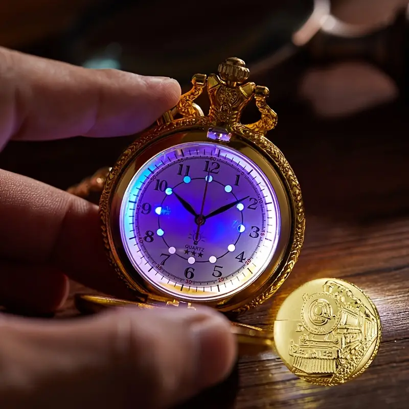 Gold analogue pocket watch with a neon blue light