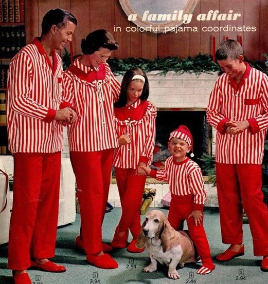 Family of 5 people in red and white matching PJ sets