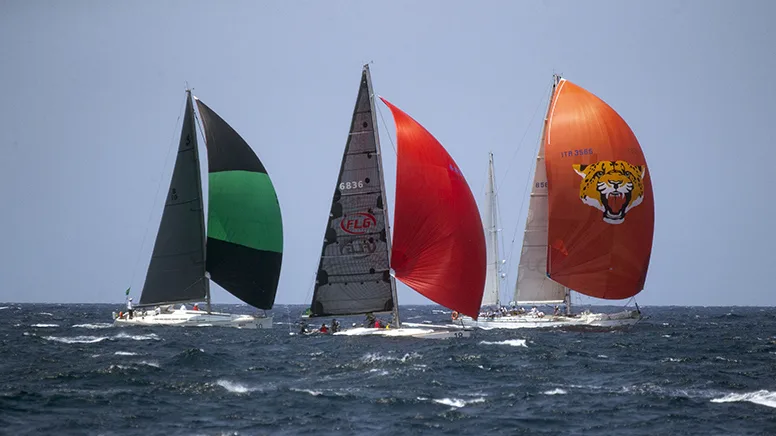 3 yachts competing in the sydney to hobart yacht race on boxing day