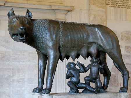 Lupercalia statue of a A medieval bronze sculpture of the she-wolf nursing Romulus and Remus