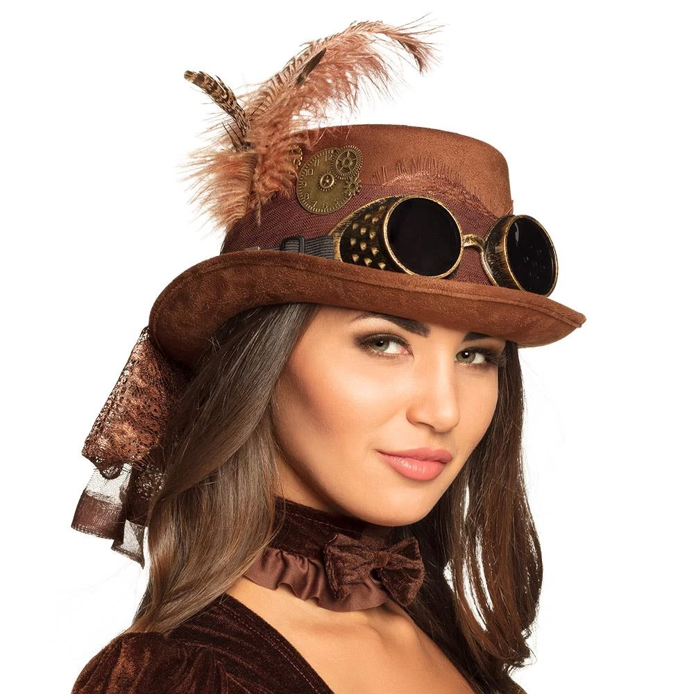 Lady wearing simple brown hat embellished iwht feathers scarf and goggles