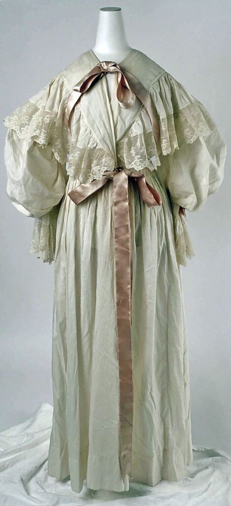 Early to mid 1800's night dress with lace and ribbon trim features