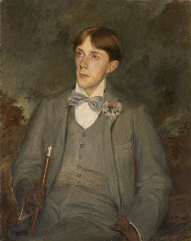 Aubrey-Beardsley in a 3 piece suit with bow tie and wooden cane -  circa 1900's