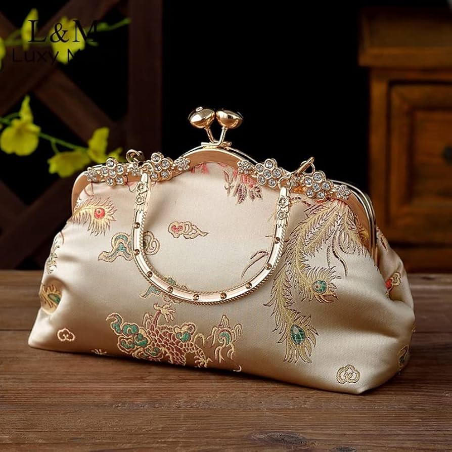 Soft embroidered evening bag with vintage clasp on top