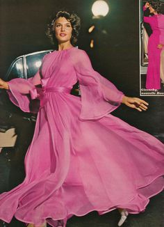 A pink chiffon 1970's dress with flowing sleeves