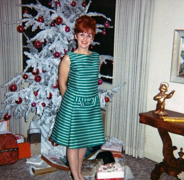 1960's green striped christmas party dress in satin finish with pleated skirt in shift style below the knee